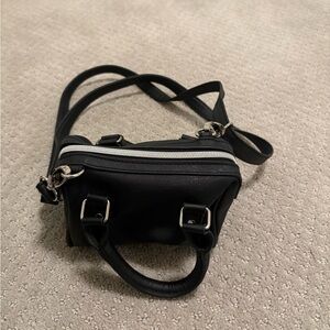 Small black crossbody bag with silver hardware!